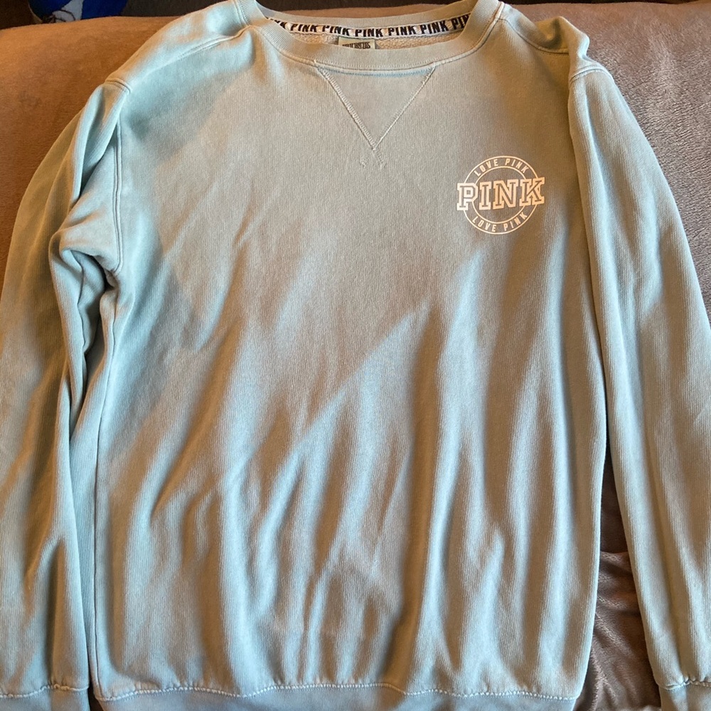 VS pink XS light blue sweatshirt